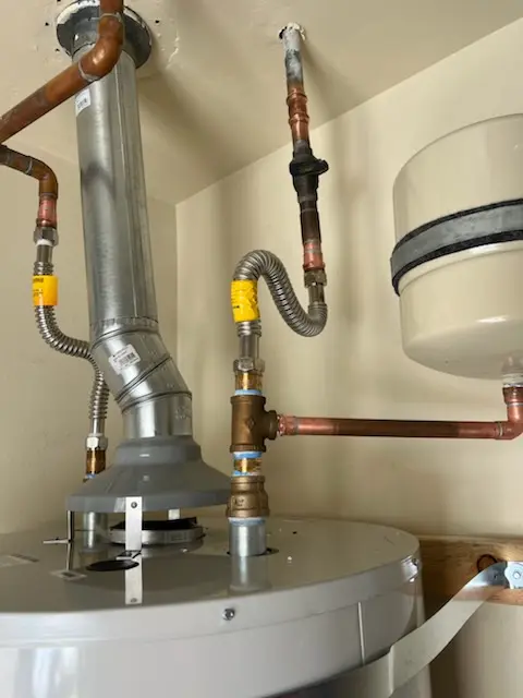 Water heater installation and plumbing repair in Maize